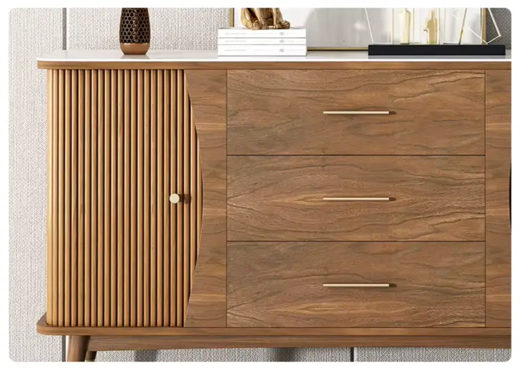 Modern minimalist wooden showcase cabinet with fluted door and three drawers, slate top, gold hardware, and wooden legs