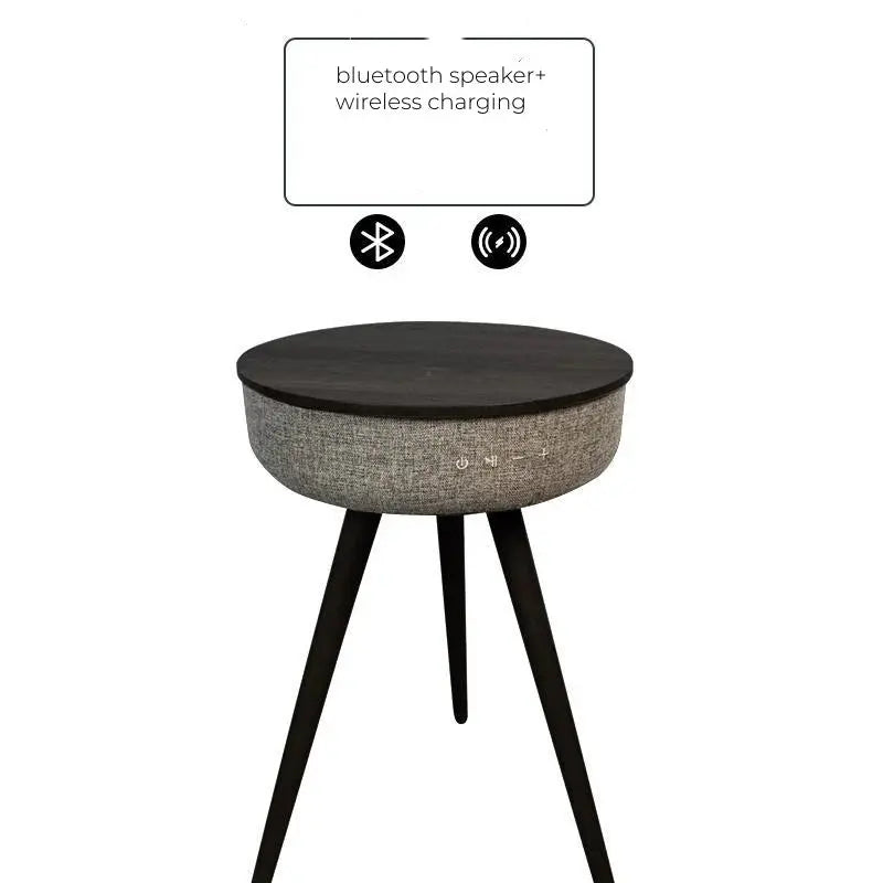 Round Smart Coffee Table with dark wood top, grey fabric side, Bluetooth speaker, and wireless charging