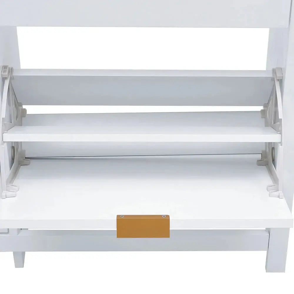 Close-up of white flip-down wood shoe cabinet's open shelf with brown handle, showing interior storage