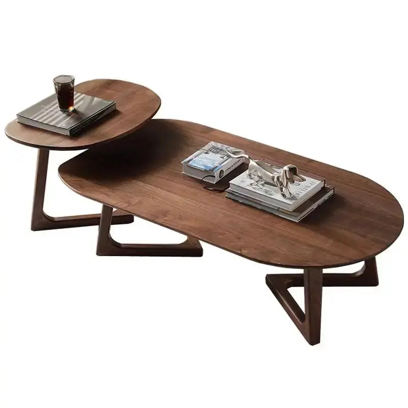 BIANXIANG modern moving coffee table in dark wood, with books and a glass on its oval surfaces, on a white background.