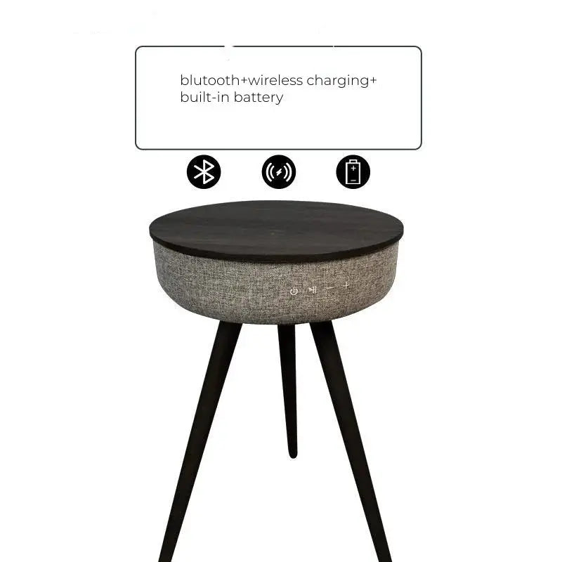 Smart coffee table with built-in Bluetooth speaker, wireless charging, and internal battery for modern living rooms