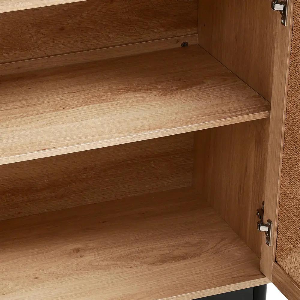 Close-up of the wooden sideboard's interior, showing two adjustable shelves for versatile storage.