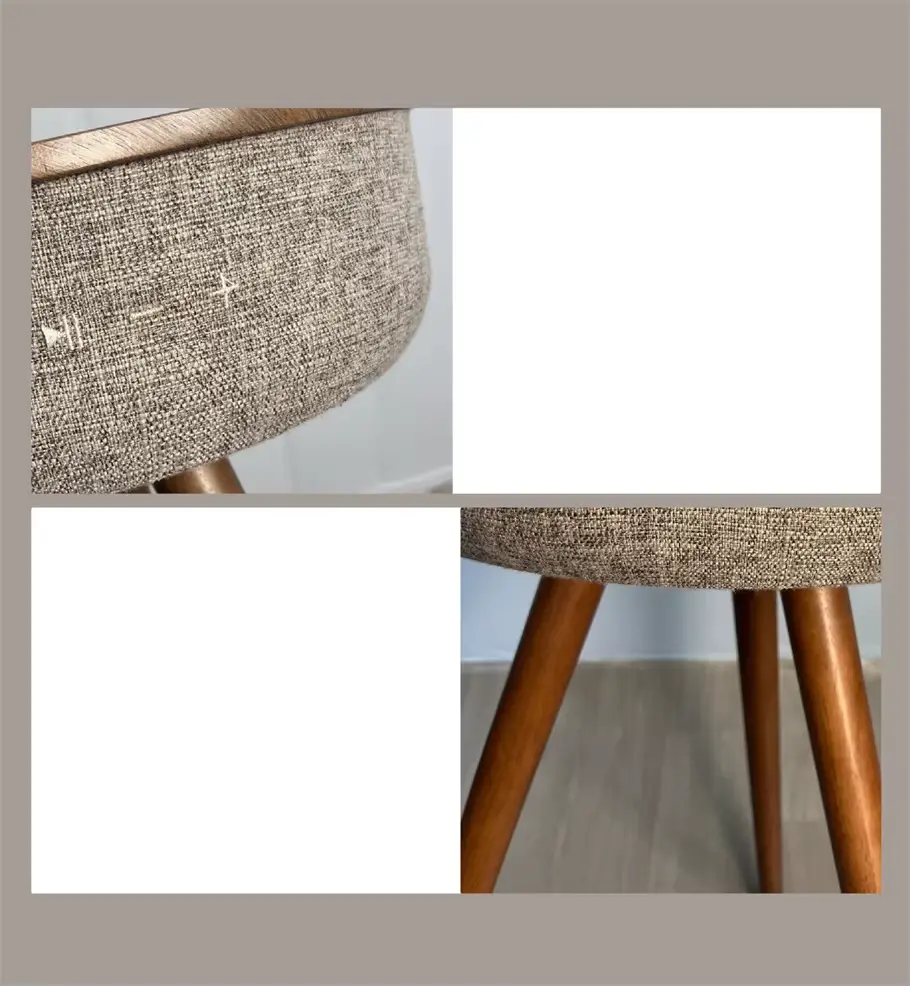 Close-up of smart coffee table features: wooden top, textured fabric speaker, and three wooden legs.