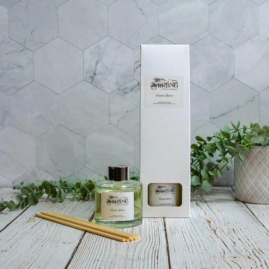 Fresh Start 100ml vegan reed diffuser, hand-poured with powdery musk and floral fragrance, box, and reeds