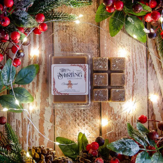 Gingerbread wax melt clamshell with six cubes, some sprinkled, beside the packaged Stirling Candle Company melt. Hand Poured.