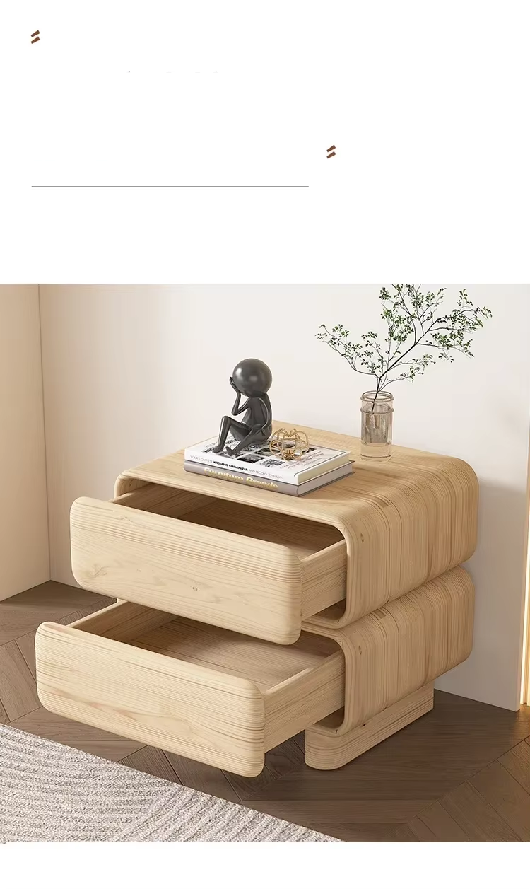 Modern Moroccan solid wood bedside table with 2 drawers, first drawer slightly open, styled with decor