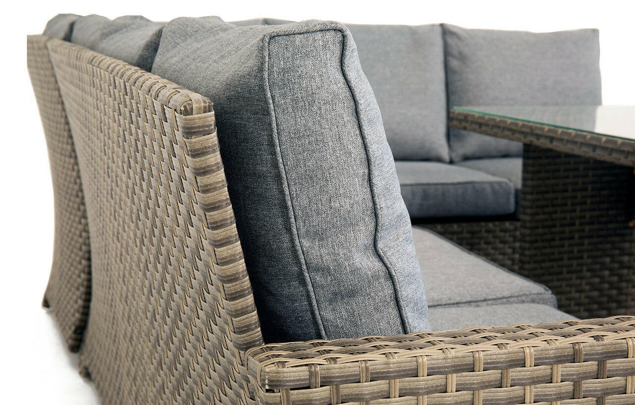 Close-up of Palma Grey Rattan Corner Sofa, showing grey woven texture and cushions. Part of the 9-seater garden dining set.