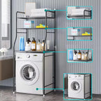 Black 3-tier over toilet storage rack with laundry machine, towels, and toiletries in a modern bathroom.