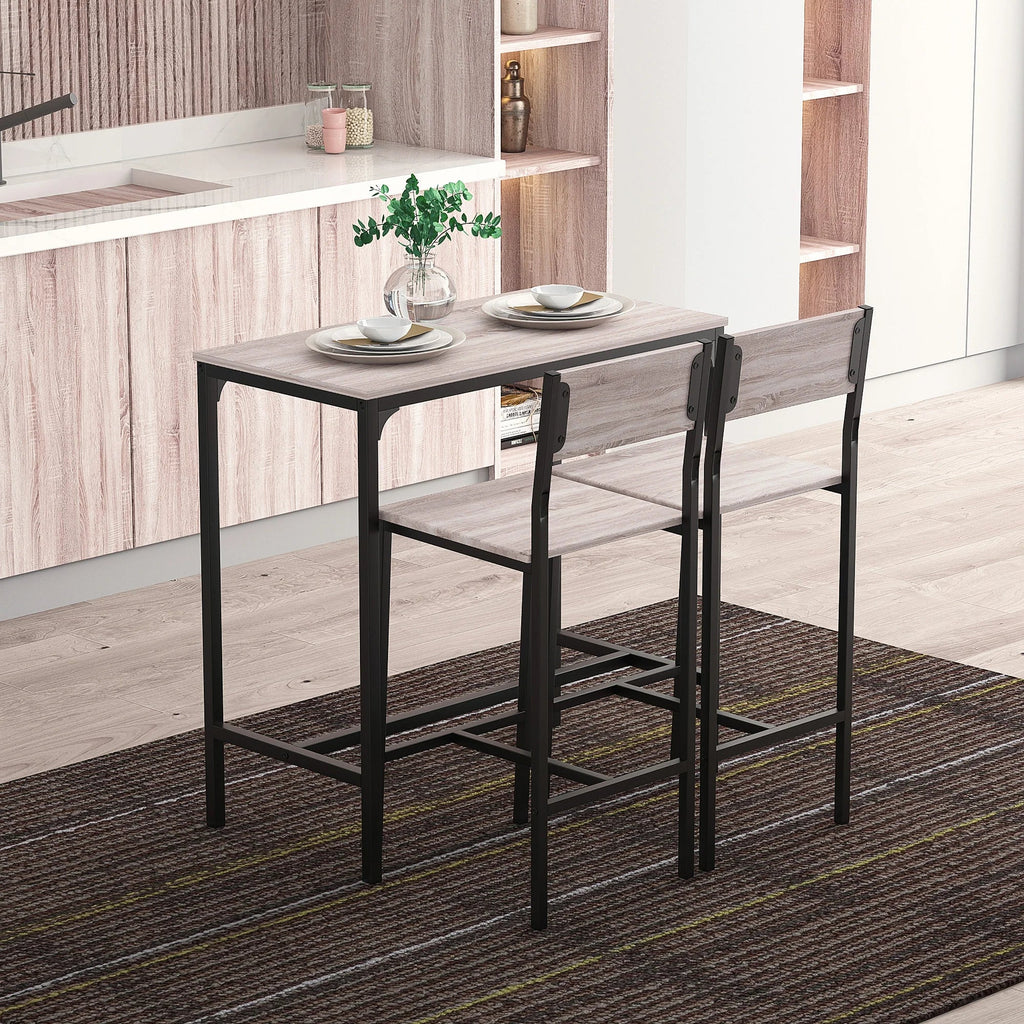 Compact grey wood grain table with two matching stools in a modern kitchen setting, ideal for small spaces.
