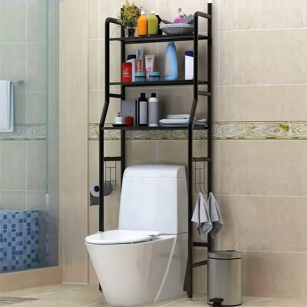 Black 3-tier over toilet storage rack with toiletries & towels in a modern bathroom, space-saving organiser