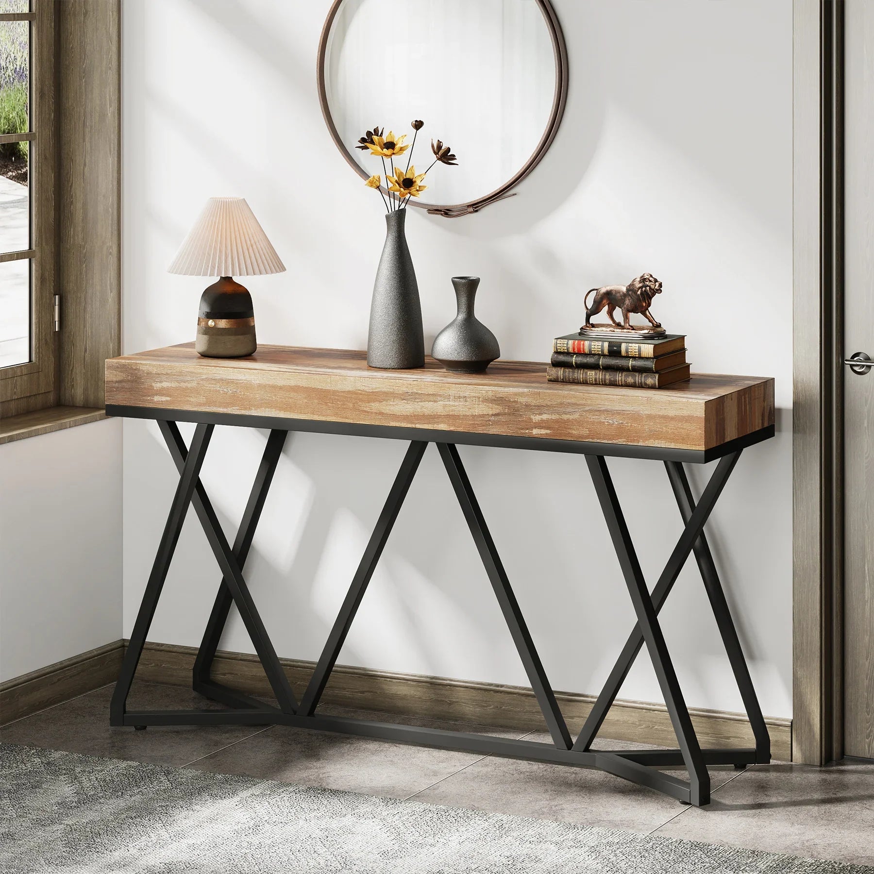 55 inch industrial console table in an entryway with a rustic wood-effect top and black metal X-legs