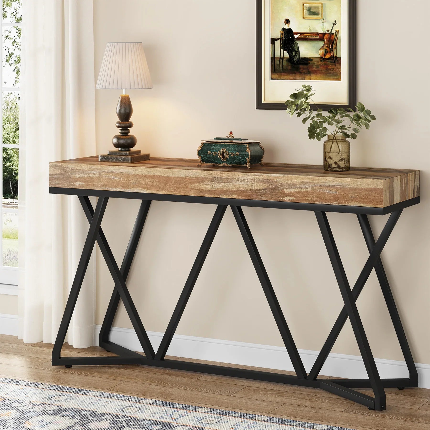 55-inch industrial console table with rustic wood-effect top and black metal geometric base in an entryway