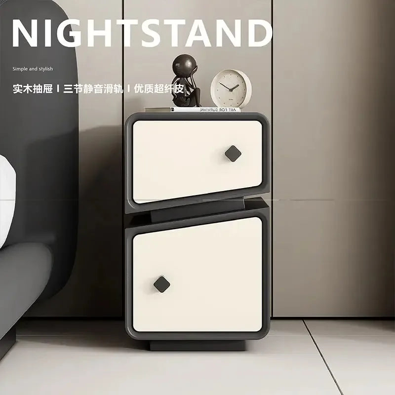 Luxury modern Morocco nightstand with two cream-colored drawers and unique black pull handles. Elegant bedside table.
