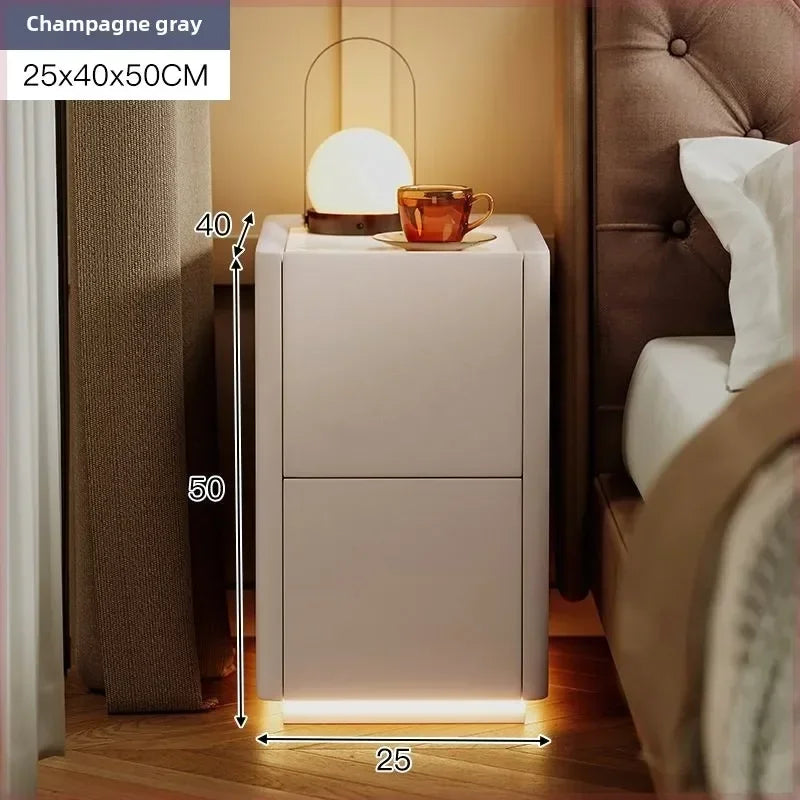 Champagne gray nightstand with measurements 25x40x50CM, featuring modern design with bottom lighting next to a bed.
