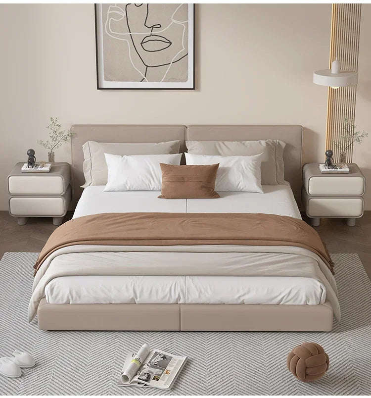 Modern Moroccan bedside table with two drawers, shown in a bedroom with a bed and rug. Perfect for storage.