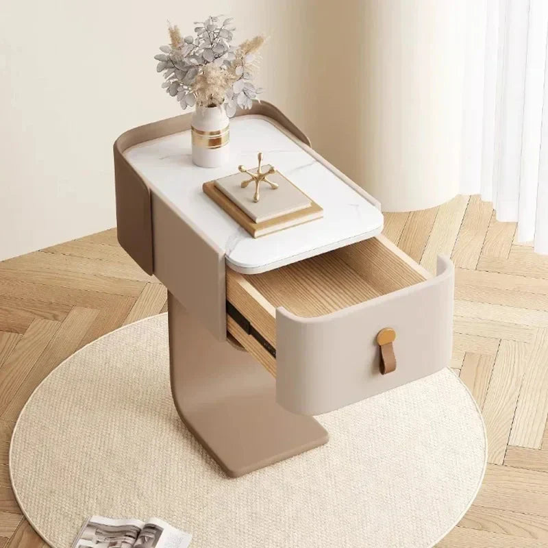 Modern Japanese nightstand with one open drawer, white marble top, and minimalist design, ideal for a bedroom.