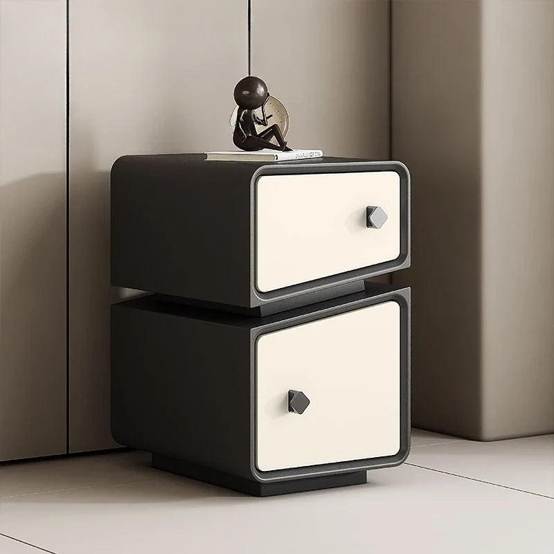 Luxury high-end nightstand, modern Moroccan style, black and cream, two drawers with unique handles, bedside table.