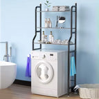 Black 3-tier over toilet storage rack with toiletries and towels in a modern bathroom, above a washing machine.