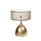 Luxury unique gold nightstand with round marble top, fabric drawer, and modern brass base for elegant bedroom.