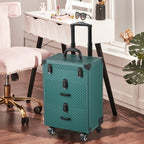 Green professional rolling makeup case with extendable handle, 3 drawers, and wheels next to a vanity.