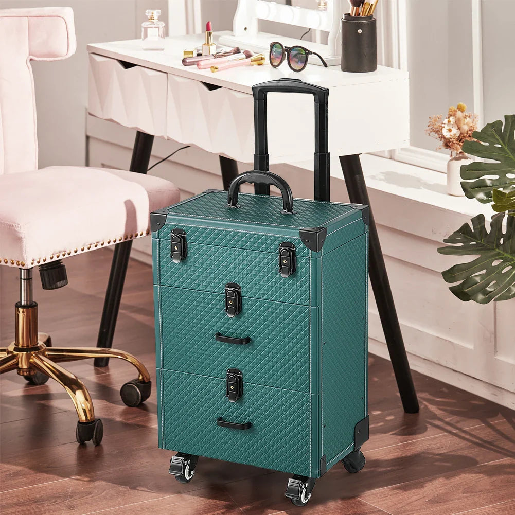 Green professional rolling makeup case with extendable handle, 3 drawers, and wheels next to a vanity.