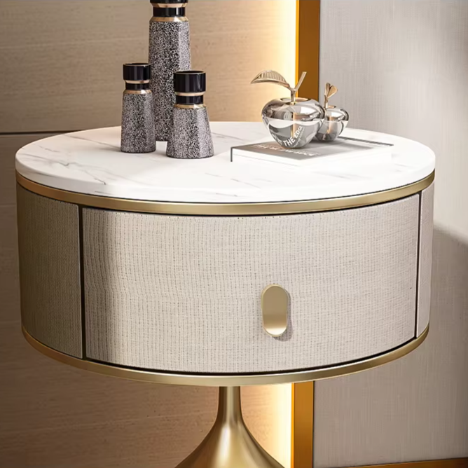 Luxury unique gold nightstand with marble top & fabric-covered drawer. Modern gold bedside table, storage cabinet.