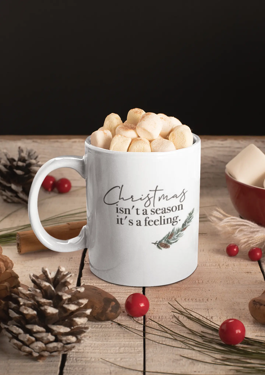 Christmas Isn't A Season It's A Feeling Christmas Ceramic Mug WinsterCreations™ Official Store