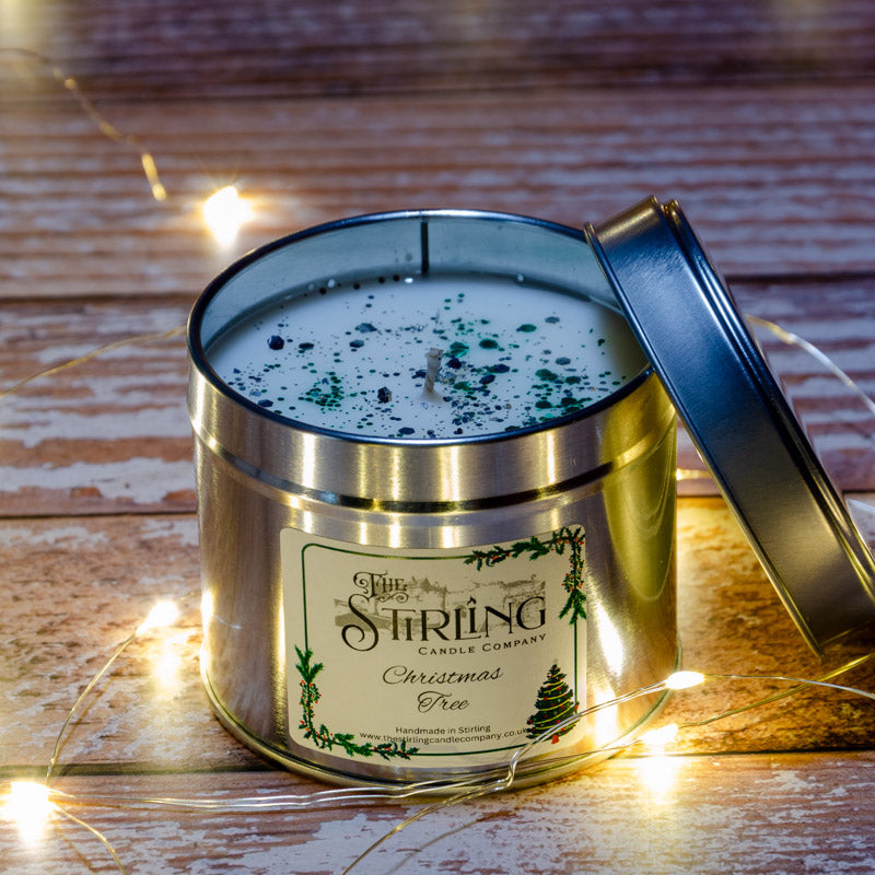 Christmas Tree travel tin candle with cotton wick, silver tin with green label, festive lights